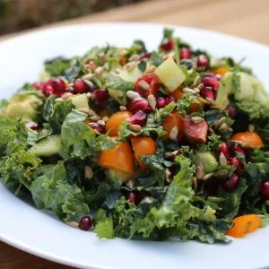 Kale salad avocado pomegranate