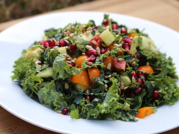 Kale salad avocado pomegranate